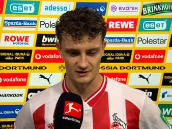 Nach der knappen Niederlage gegen den BVB ringt Eric Martel vom 1. FC Köln um Worte und zeigt sich sichtlich angefasst aufgrund der Horror-Verletzung von Timo Hübers.